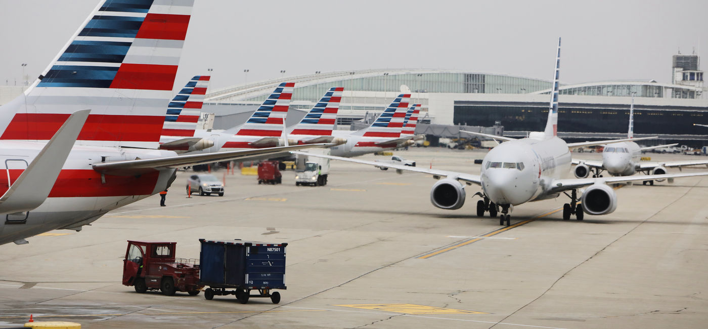 Image: American Airlines' airplanes active on an airport tarmac. 